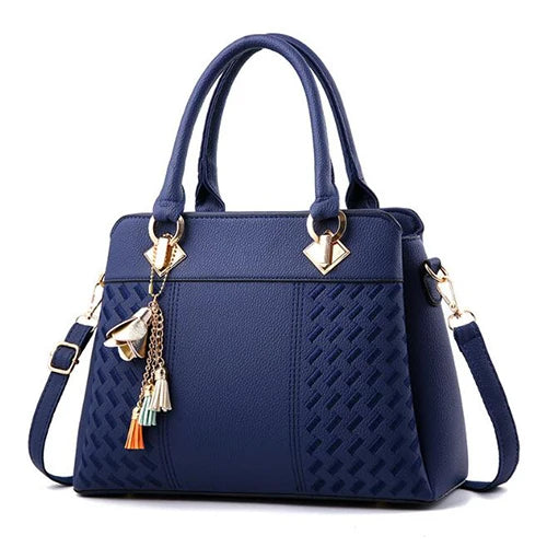Bolso Aurora con Bordados Exclusivos y Elegantes Detalles de Borlas