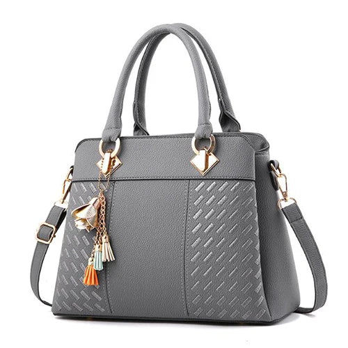 Bolso Aurora con Bordados Exclusivos y Elegantes Detalles de Borlas