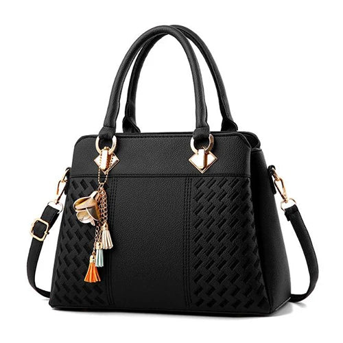 Bolso Aurora con Bordados Exclusivos y Elegantes Detalles de Borlas
